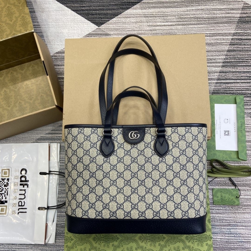 G*u*i shopping bags